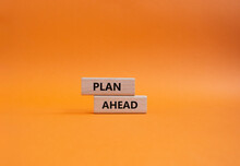 Plan Ahead Symbol. Wooden Blocks With Words Plan Ahead. Beautiful Orange Background. Business And 'Plan Ahead' Concept. Copy Space.