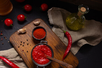 Canvas Print - Chilly pepper and tomato sauce ingredient for homemade cooking at table. Chilli and recipe