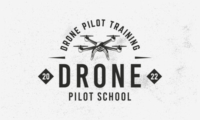 Wall Mural - Drone, UAV pilot school logo, poster. Drone pilot training. Drone trendy logo with vintage drone icon. Vector emblem template.