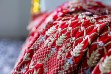 Indian Punjabi Bride's Red Wedding Outfit Fabric And Textile Close Up