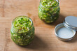 © View Stock - Glass bottles of manual magnificent green chilli sauce