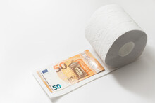 Fifty Euro Banknote Inside A Toilet Paper Roll.