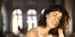 © Look! - Close-up of relaxed young caucasian woman smiling with her eyes closed on blurry background. Brunette with bob haircut is relaxing in cafe summer. Enjoying little things, positive attitude concept