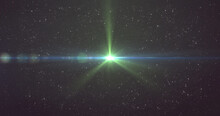 Image Of Glowing Green Light Over Stars On Night Sky