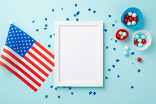 USA Independence Day Concept. Top View Photo Of Photo Frame National Flag Paper Backing Molds With Candies And Confetti On Isolated Pastel Blue Background With Blank Space