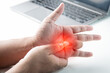 Trigger finger disease, fingers pain from work with computer.Office syndrome concept.