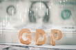 GDP symbol.Gross domestic product with dollar bills. Business and financial concept.