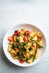 Wall Mural - Pasta salad with grilled vegetables, zucchini, eggplant, asparagus and tomatoes.