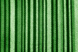 close up of the stripped green fabric texture background