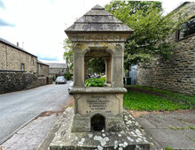 A Stone Built Memorial Monument, In The Centre Of The Old Village Of, Long Preston, Skipton, UK