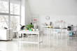 © Pixel-Shot - Interior of medical laboratory with modern workplace, microscope and chemical glassware