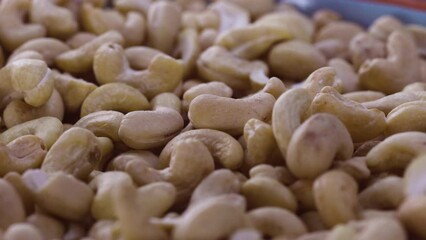 Wall Mural - Cashews Falling into Bowl