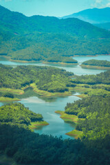 Wall Mural - Morning at the Ta Dung lake or Dong Nai 3 lake with green hills and mountains. Travel and landscape concept. Travel concept.