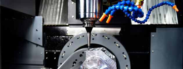 Wall Mural - the 5-axis cnc mills machines for design configuration that utilizes a swivel head machine table and