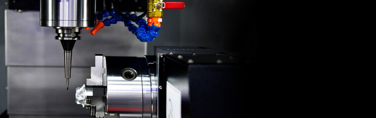 Wall Mural - the 5-axis cnc mills machines for design configuration that utilizes a swivel head machine table and