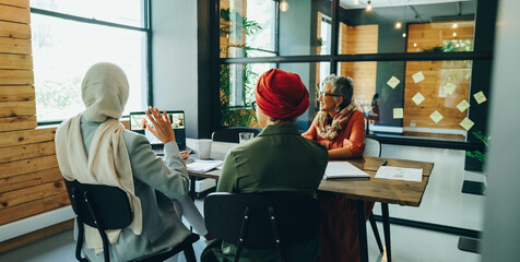 Wall Mural - Virtual meeting in a multicultural workplace