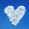 Heart shaped cloud in the blue sky
