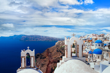 Wall Mural - Santorini scenry , iconic view of Oia village with churches. Greece, Cyclades