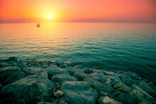 Rocky Shore Of The Sea Of Galilee At Sunrise