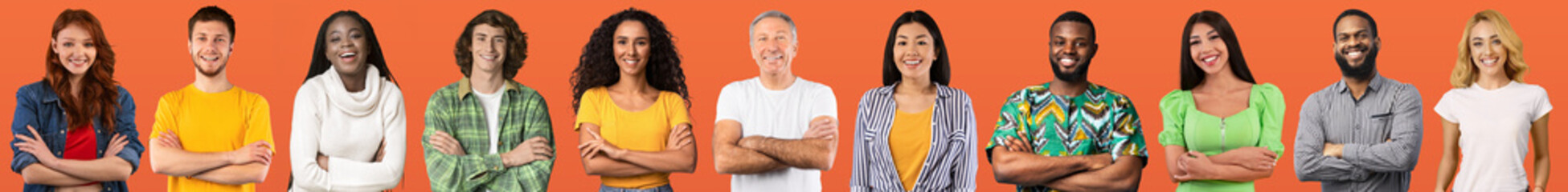 Sticker - Beautiful international team posing on orange studio background