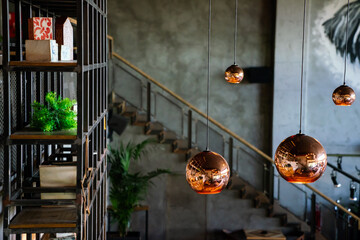 Interior decoration of stylish housing. Loft style incandescent lamp. Modern style home design.