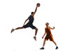 Dynamic portrait of two young men, professional basketball players in motion, training isolated over white studio background