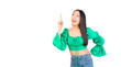 © Png - Video - Photo - Attractive beautiful positive happy smile asian woman hands point up and pose with empty space wearing green shirt and jeans.