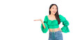 © Png - Video - Photo - Attractive beautiful positive happy smile asian woman hands point up and pose with empty space wearing green shirt and jeans.