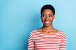 © deagreez - Photo of curious dreamy positive lady look side empty space beaming smile wear striped shirt isolated blue color background
