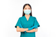 © Png - Video - Photo - portrait asian female doctor in scrubs standing pointing fingers protection flu cold facial mask white background copy space for your advertisement, Self-isolation, social distancing.