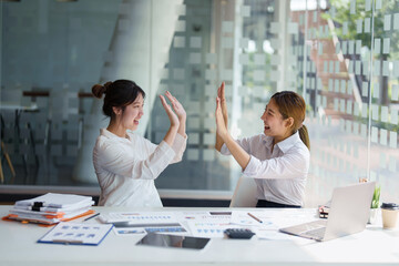 Wall Mural - Business Success concept with partner, Partnership Giving Fist Bump after Complete a deal. Successful Teamwork, Businessman with Team Agreement in Corporate.