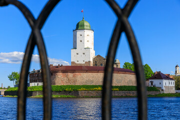 Poster - Medieval fortress in Vyborg. shot through the embankment fence