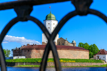 Poster - Medieval fortress in Vyborg. shot through the embankment fence