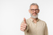 © InsideCreativeHouse - Happy european mature middle-aged man in beige shirt and glasses showing thumb up, good quality, positive attitude isolated in white background