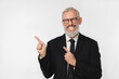 © InsideCreativeHouse - Positive caucasian mature middle-aged businessman ceo boss lawyer teacher freelancer pointing showing copy space free space isolated in white background