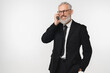 © InsideCreativeHouse - Successful rich caucasian mature middle-aged businessman ceo boss employee lawyer in formal suit talking on cellphone with clients customers, working online isolated in white background