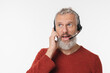 © InsideCreativeHouse - Curious caucasian mature middle-aged man operator freelancer IT-support manager talking with clients customers, consulting in headphones isolated in white background. Hotline work