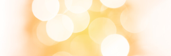 Wall Mural - Summer orange sparkling glitter bokeh background, banner texture. Abstract defocused lights header. Wide screen wallpaper. Panoramic web banner with copy space for design