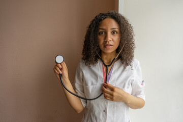 Wall Mural - Young medical african surprised girl student