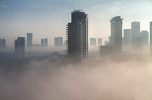 Heavy Fog In Tel Aviv. View Above. The City Over The Clouds