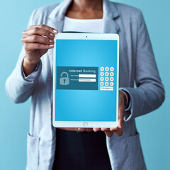Poster - Pay your accounts on your digital tablet. Studio shot of an unrecognizable woman holding a tablet displaying an internet banking webpage against a blue background.