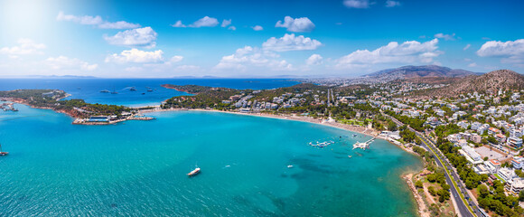 Wall Mural - aerial panorama of the beach at vouliagmeni, south riviera coast of athens, greece, with emerald, cl