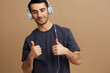 © SHOTPRIME STUDIO - portrait man Listening to music with headphones fun isolated background