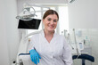 © Tania - Portrait of a young beautiful female dentist