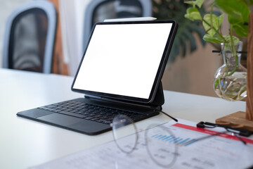 Wall Mural - Cropped shot of worktable with mock up two laptop, stationery and supplies in co working space