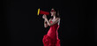 young girl in a red dress with a megaphone