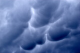 Fototapeta Sypialnia - Heavy thunderstorm blue clouds Mammatus cloud