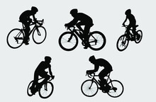 Silhouette Of A Person Riding A Bicycle