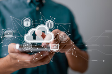 Leinwandbilder - A guy uses a smartphone while holding a cloud computing diagram. Cloud computing, data storage, networking, and internet service principles.