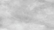 © Creative - Grey textured background. Dark edges. Copy space